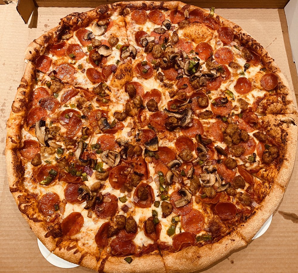 Zesty Zzeeks Pizza & Wings 4050 S Arizona Ave suite 4, Chandler
