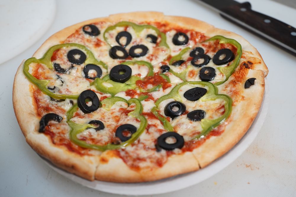 G’s Famous Pizza & La Favorita Deli Grocery 3722 103rd St, Flushing