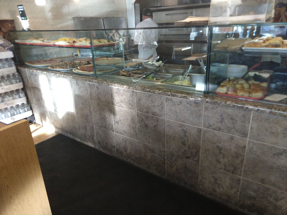 Mario's Pizza 14929 Guy R Brewer Blvd, Jamaica