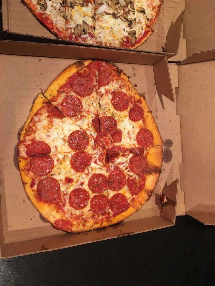 Muncheez Pizzeria 600 W College Ave, Appleton